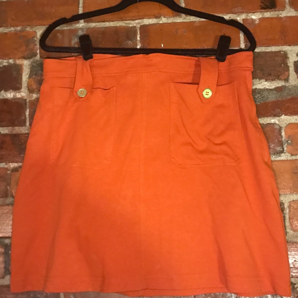 Super cute orange H&M miniskirt with gold buttons